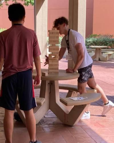 kids playing jenga